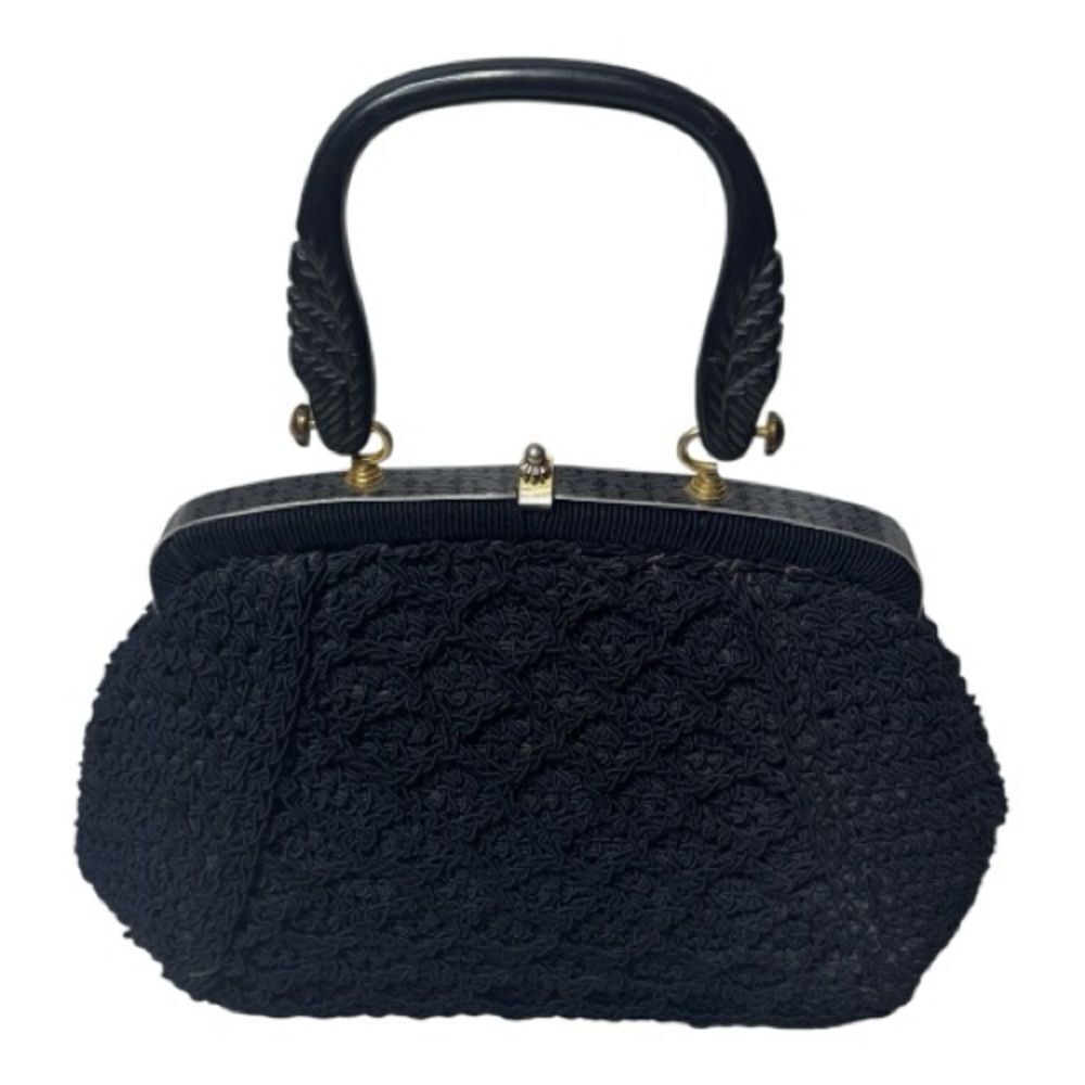Vintage 60’s Black Knit Dumpling Bag With Silver And Gold Fixtures.